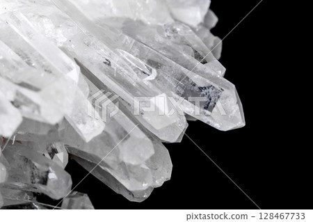 Macro Mineral Stone Rhinestone in Crystals on a Black Background 128467733