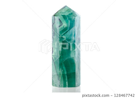 Macro mineral stone Fluorite crystal on a black background 128467742