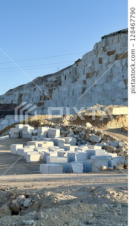 Marble quarry sunlight. white large blocks in the rays of sunset.High quality photo 128467790