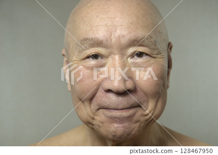 Old man with a smile 128467950