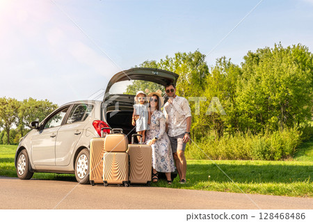 Car trip family. Parents child vehicle. Journey countryside freedom sunlight. Car trip family. Parents child vehicle. Journey countryside freedom sunlight. 128468486