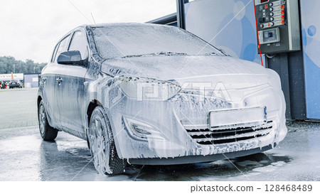 Car wash background. Car washing station foam. Man self service detail splash. 128468489