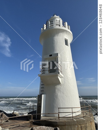 Lighthouse in the morning sun Lighthouse in the morning sun 128468648