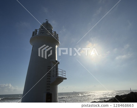 Lighthouse in the morning sun 128468663