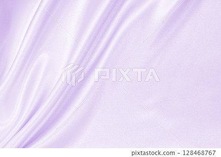 Smooth elegant lilac silk or satin texture as wedding background. Luxurious valentine day background design 128468767