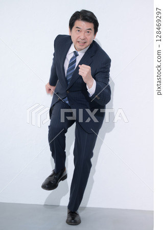 Full body of a senior businessman in a running pose. Image of a president or manager heading towards a goal or future 128469297