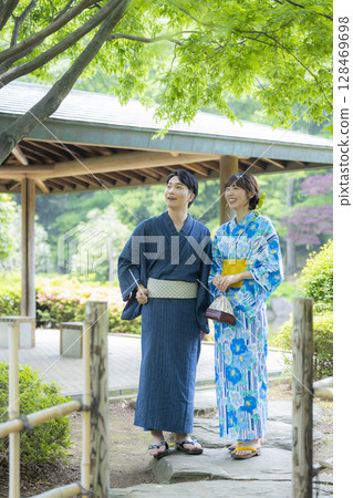 Men and women on a date in yukata Men and women on a date in yukata 128469698