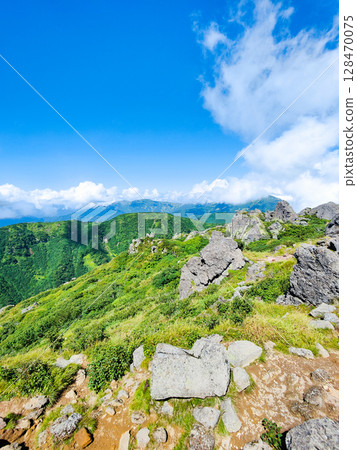 Climbing Mt. Myoko in summer (view of Mt. Mitahara and Mt. Hiuchi from the summit of the southern peak) 128470075