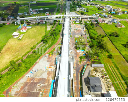 Aerial view of the Hokkaido Shinkansen Sapporo extension construction work around Shin-Hakodate-Hokuto Station in Hokuto City, Hokkaido in summer 128470553