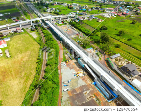 Aerial view of the Hokkaido Shinkansen Sapporo extension construction work around Shin-Hakodate-Hokuto Station in Hokuto City, Hokkaido in summer Aerial view of the Hokkaido Shinkansen Sapporo extension construction work around Shin-Hakodate-Hokuto Station in Hokuto City, Hokkaido in summer 128470554