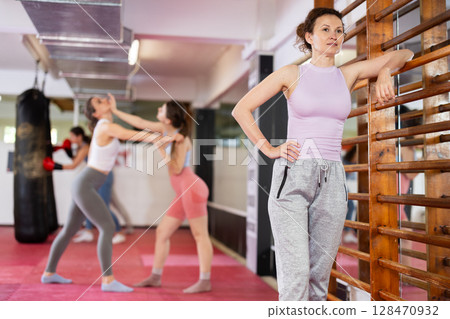 Women Standing Near Stairs 128470932