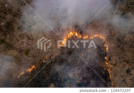 Wildfires release carbon dioxide (CO2) emissions and other greenhouse gases (GHG) that contribute to climate change. 128472207