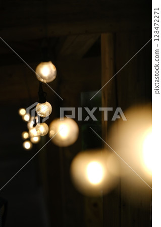 An image of a lit lamp flashing 128472271