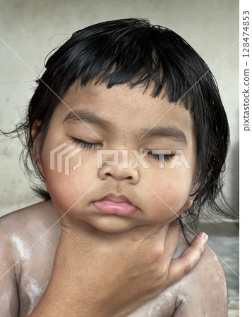 Close up portrait of little Asian girl sleeping Close up portrait of little Asian girl sleeping 128474853
