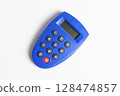 Blue internet banking token used to generate password for online transactions, isolated on white. 128474857