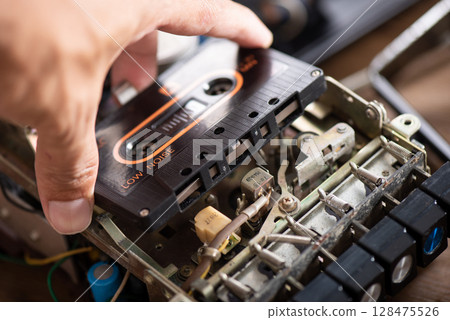 Fixing vintage radio cassette recorder Fixing vintage radio cassette recorder 128475526
