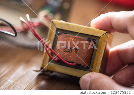 An old Laminated core transformer 128475532