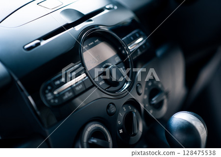 Modern car radio and CD player 128475538