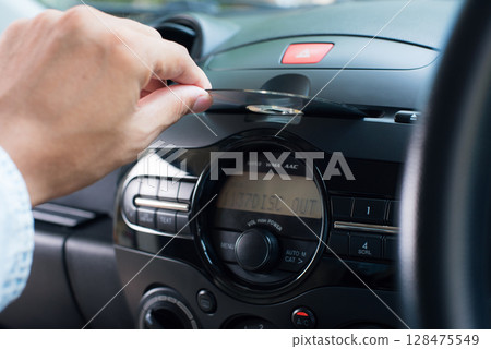 Modern car radio and CD player 128475549