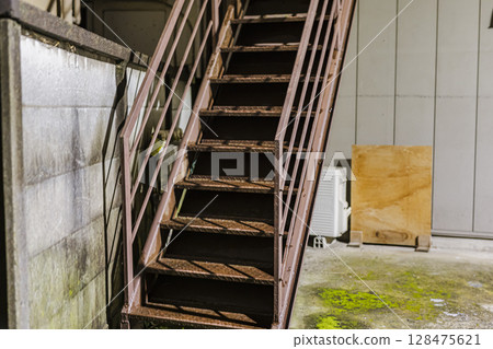 Outdoor stairs in a retro apartment 128475621