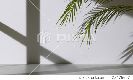 Concrete texture background with shadows from natural light streaming through a window. 128476607