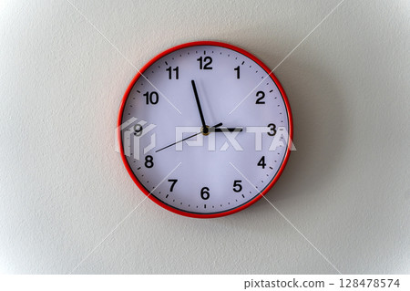 Round Wall Clock on Light Minimal Background 128478574