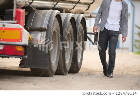Young truck driver in casual clothes 128479114