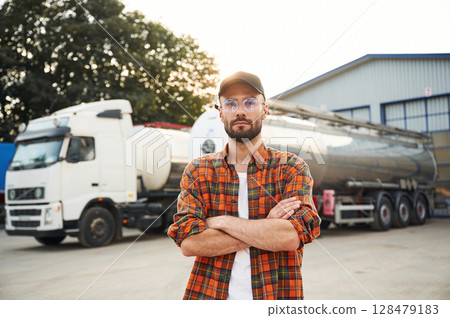 Front view. Young truck driver in casual clothes 128479183