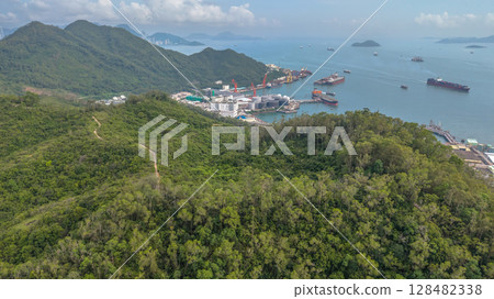 July 13 2025 View of Lush Green Forests Near a Bustling Coastal Port July 13 2025 View of Lush Green Forests Near a Bustling Coastal Port 128482338