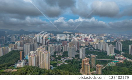 July 13 2025 Residential Towers Overlooking Green Hills and Urban Cityscapes July 13 2025 Residential Towers Overlooking Green Hills and Urban Cityscapes 128482379