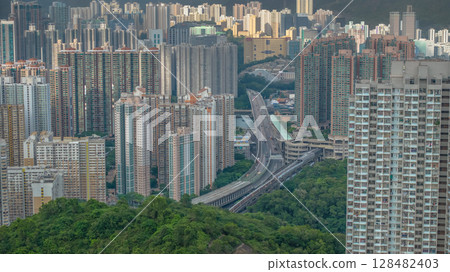 July 13 2025 Urban Residential Area with High-Rise Buildings and Green Spaces 128482403