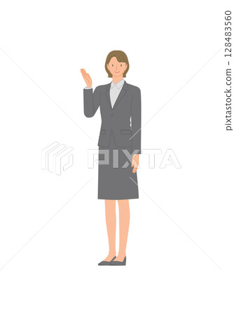 Smiling young woman in a business suit: pointing with hand 128483560