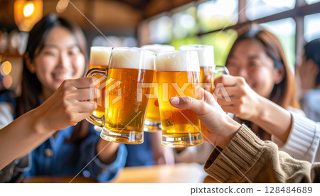 A toast with beer 128484689