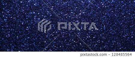 Navy blue sparkling background from small sequins, macro. Shiny glitter backdrop for Christmas or New Year 128485564