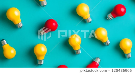 Colorful light bulbs on a vibrant turquoise background. Yellow, red light bulbs in a row on a color backdrop. Creativity, innovation, and bright ideas concept. Creative inspiration. Innovative notions 128486966