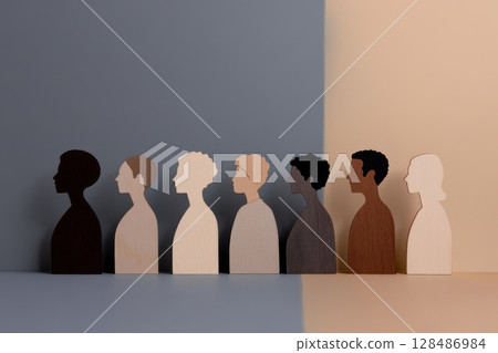 Diverse Human Wooden Silhouettes Variety. Inclusivity, Unity, Acceptance of All. Diversity and inclusion. People Figurines Standing in a Row. Unity, representation within society. Close to each other 128486984