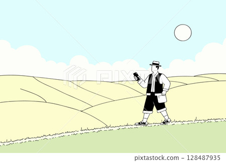 Man with Mobile Phone in Rural Landscape Man with Mobile Phone in Rural Landscape 128487935