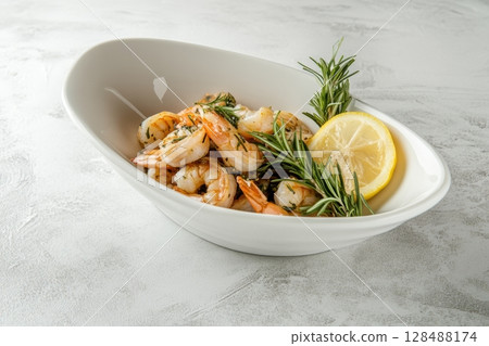 Shrimp Plate. Seafood. Gourmet king prawn in the bowl. A bowl of fresh shrimp served with lemon wedges and parsley garnish. Prawns. Jumbo Shrimp Scampi Sauteed in Butter and Olive Oil. Preparation 128488174