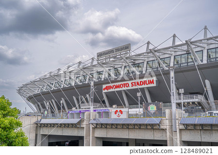 The exterior of Ajinomoto Stadium under a cloudy sky (Chofu, Tokyo) 128489021
