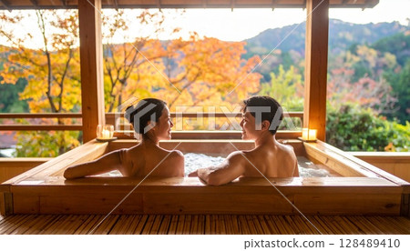 Men and women enjoying bathing at a hot spring inn 128489410
