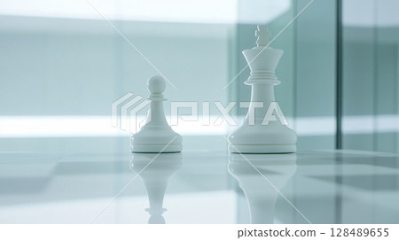 Chess pieces on reflective surface in modern setting, strategic game concept Chess pieces on reflective surface in modern setting, strategic game concept 128489655