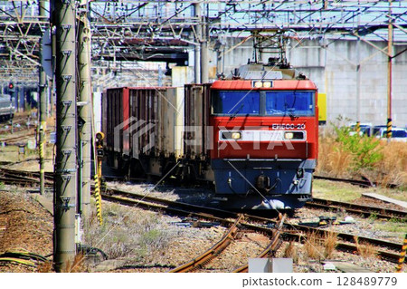 EH500 electric locomotive that pulls a container freight train EH500 electric locomotive that pulls a container freight train 128489779