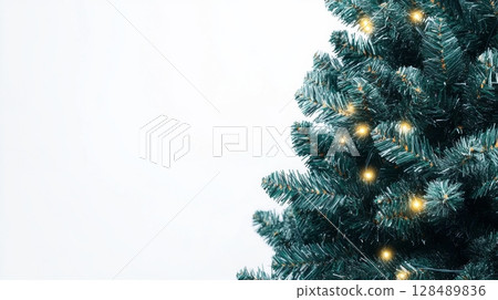 Christmas tree with lights on white background, festive holiday concept 128489836