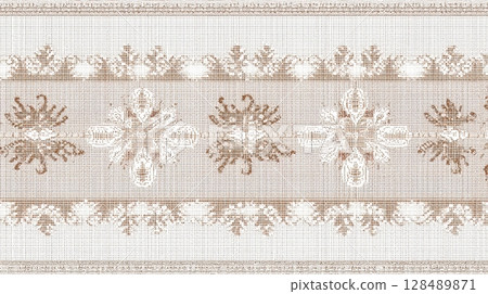 Intricate beige and white floral cross-stitch pattern on fabric 128489871