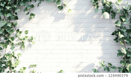 White brick wall with ivy vines casting shadows, nature and architecture concept 128490379