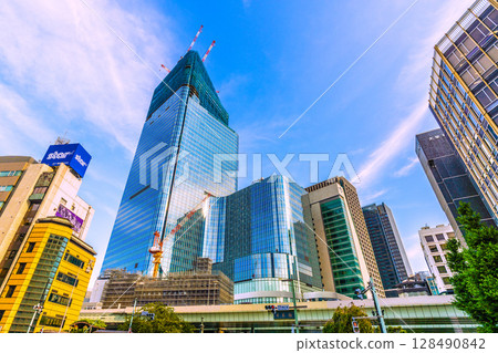 Tokyo cityscape in July. View of the redevelopment projects in Nihonbashi and Nihonbashi 1-chome. In a new era... Tokyo cityscape in July. View of the redevelopment projects in Nihonbashi and Nihonbashi 1-chome. In a new era... 128490842