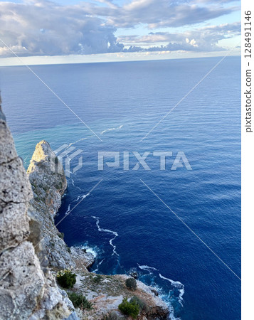 Cliffside forest coastline. High quality photo Cliffside forest coastline. High quality photo 128491146