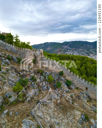 fortress on a rock near the sea coast 128491190