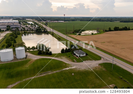Flooded road in rural area. Flooded road in rural area. 128493804