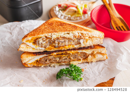 Hot sandwiches eaten outdoors Hot sandwiches eaten outdoors 128494528